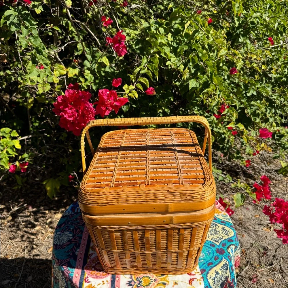 Large Vintage Handmade tan rattan picnic basket with handles.